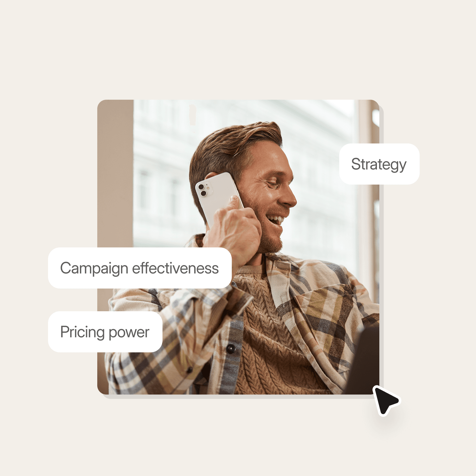 A lifestyle photo graphic on a warm off-white background. A smiling man in a layered plaid and knit outfit holds a white smartphone to his ear, photographed against a blurred building exterior. Three white rounded-rectangle label tags are overlaid on the image: "Strategy" on the upper right, "Campaign effectiveness" on the middle left, and "Pricing power" on the lower left. A cursor icon sits at the bottom right corner of the image frame.