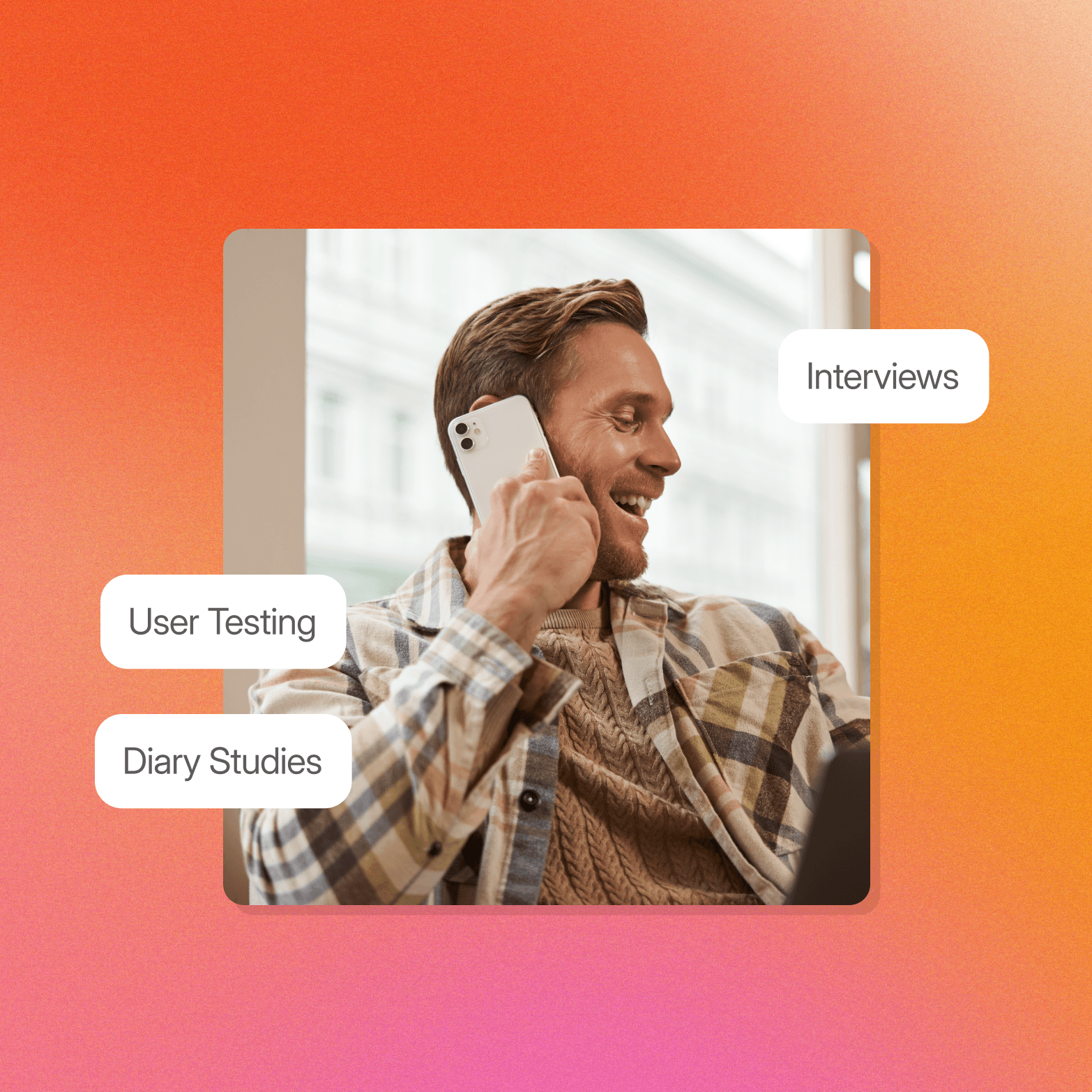 A smiling man holds a smartphone to his ear in a casual indoor setting, with three white pill-shaped labels overlaid around the image: "Interviews" (right), "User Testing" (left), and "Diary Studies" (lower left). The image sits on a warm orange-to-pink gradient background.