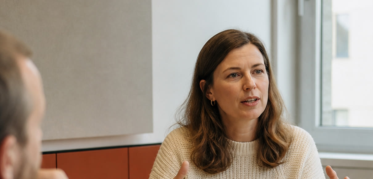 A commercial lead talking colleagues through consumer evidence in a meeting