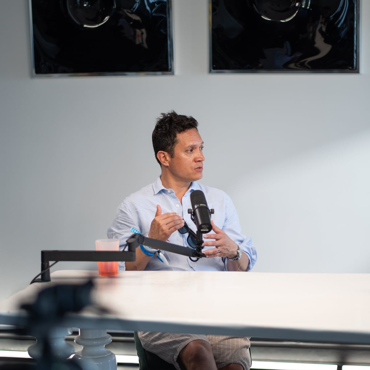 Miguel Avalos of LinkedIn talking at the microphone on the Conveo podcast set at Cannes Lions 2026