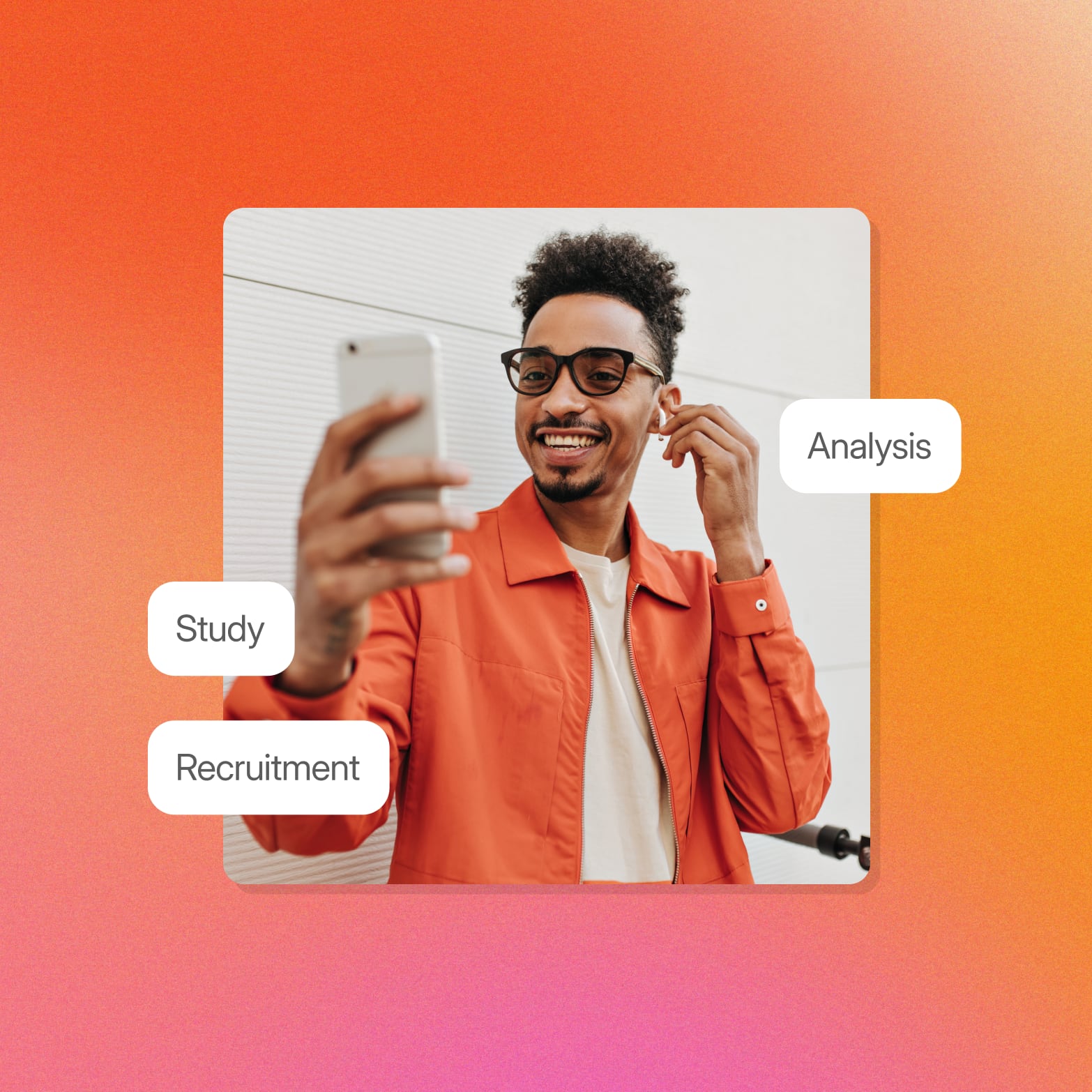 Smiling man in an orange jacket recording himself on his phone, framed by Study, Recruitment and Analysis labels from a video research workflow